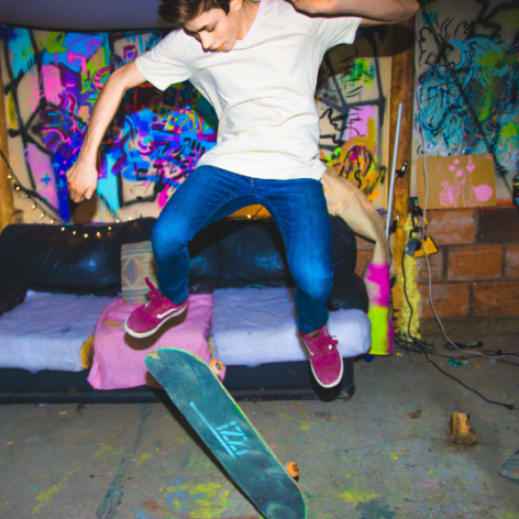 skateboarding teen boy